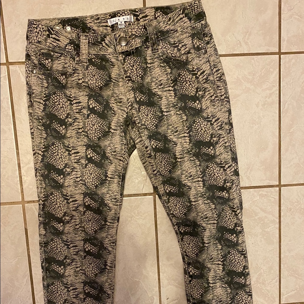 Snakeskin skinny jeans